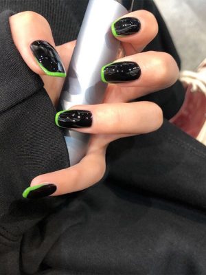 Black and green fingertips