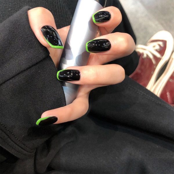 Black and green fingertips